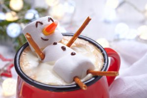 Snowman in a cup of hot chocolate